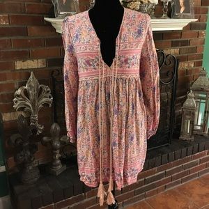 Boho style rayon dress with tassels.